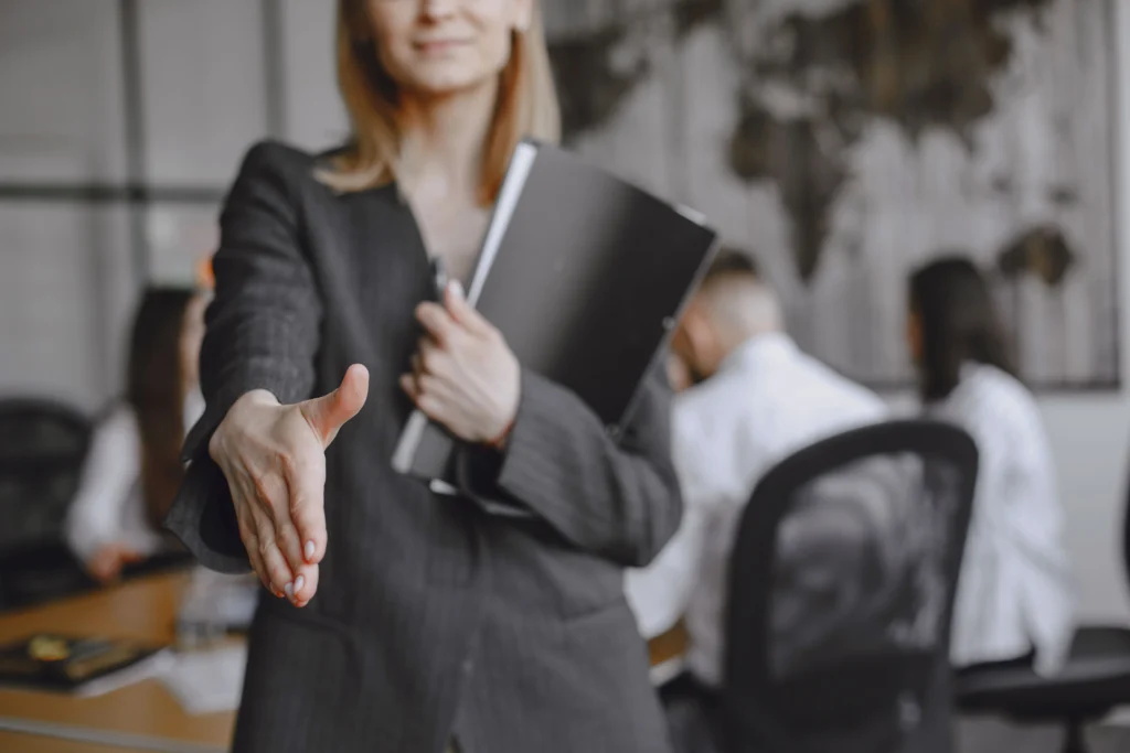 Professional handshake in office meeting California Employment Lawyers